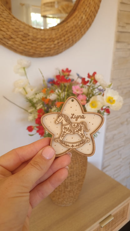 Petite étoile de Noël cheval à bascule